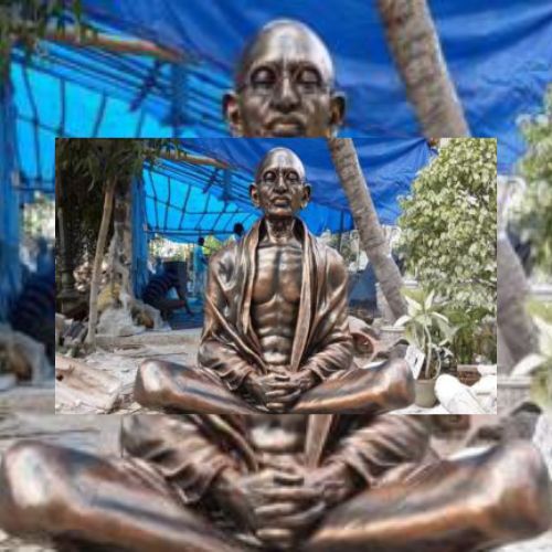 Sitting Mahatma Gandhi