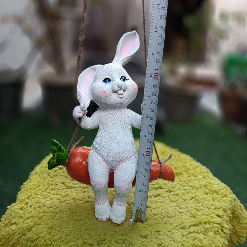 Carrot on rabbit hanging
