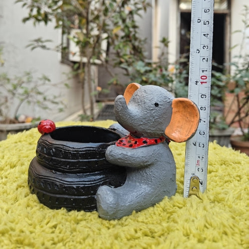 Elephant on tyre planter