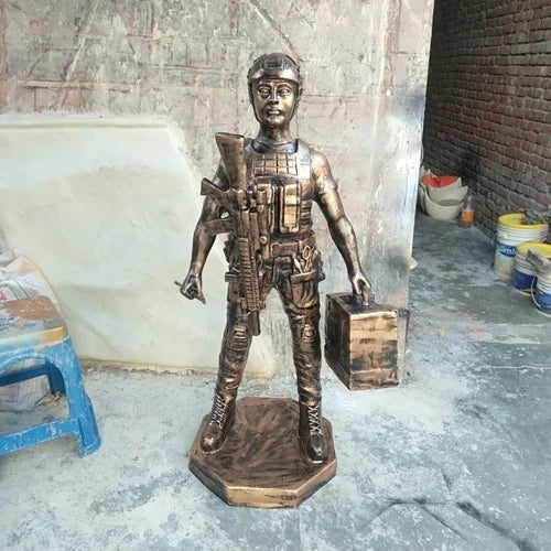 Boy With Gun Statue