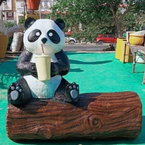 Panda On Wooden Log