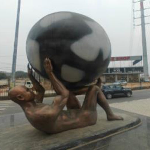 Man Holding Earth