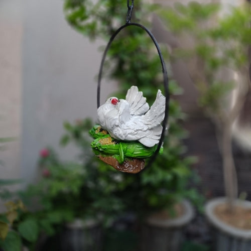 Ring white bird hanging