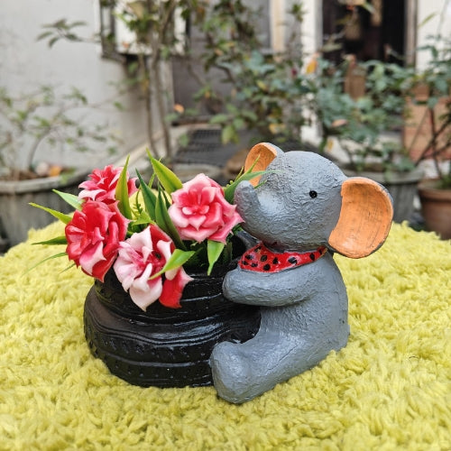 Elephant on tyre planter