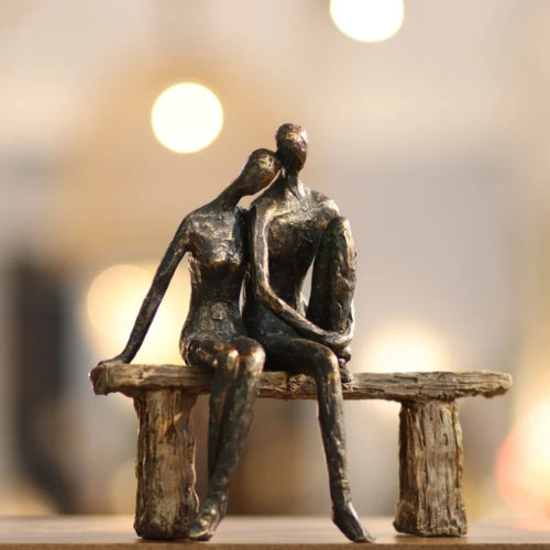 Couple Sitting on Bench Statue