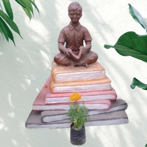 Student On Book Statue